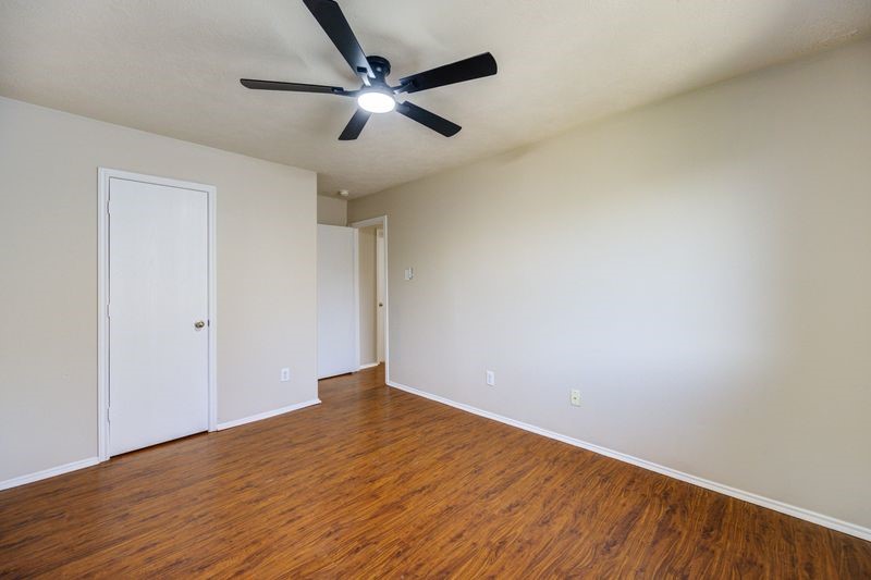 11010 Crosby Field Lane Houston, TX 77034 - Photo 9 of 15 wooden floor in an empty room