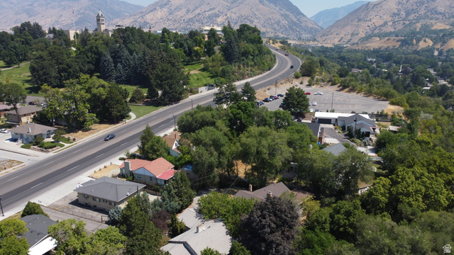 6 Terrace Place Logan, UT 84321 - Photo 2 of 26 Aerial perspective showcasing a residential area with varied rooflines and extensive mature tree coverage with easy access to Old Main and Utah State University.