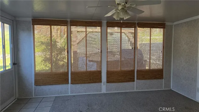 a room with sliding glass door