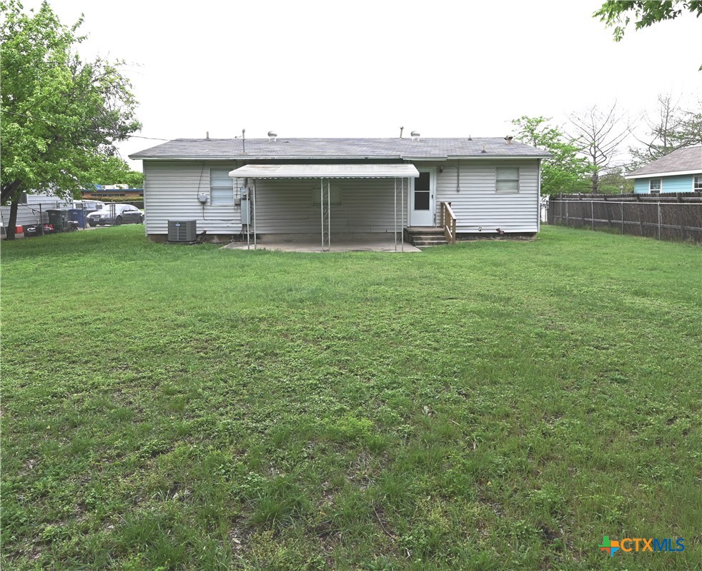 707 South 5th Street Copperas Cove, TX 76522 - Photo 16 of 19 a front view of house with a garden