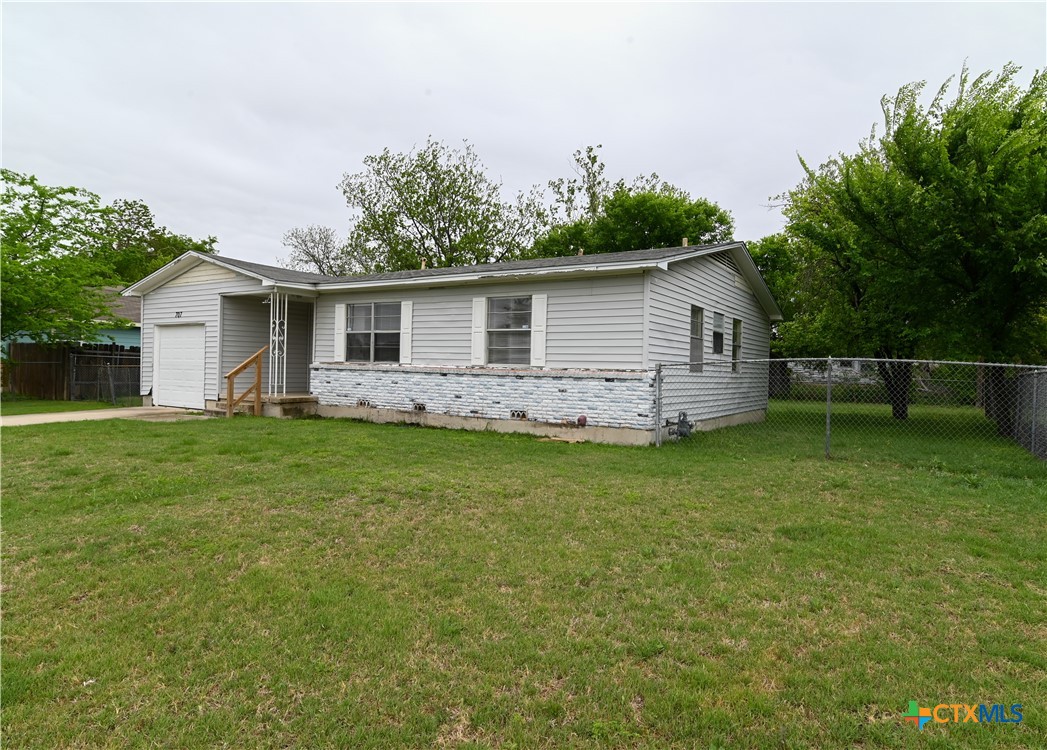 707 South 5th Street Copperas Cove, TX 76522 - Photo 2 of 19 a front view of house with yard and green space