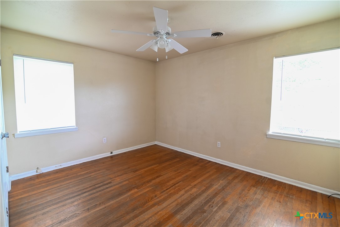 707 South 5th Street Copperas Cove, TX 76522 - Photo 7 of 19 a view of a room with wooden floor and a window