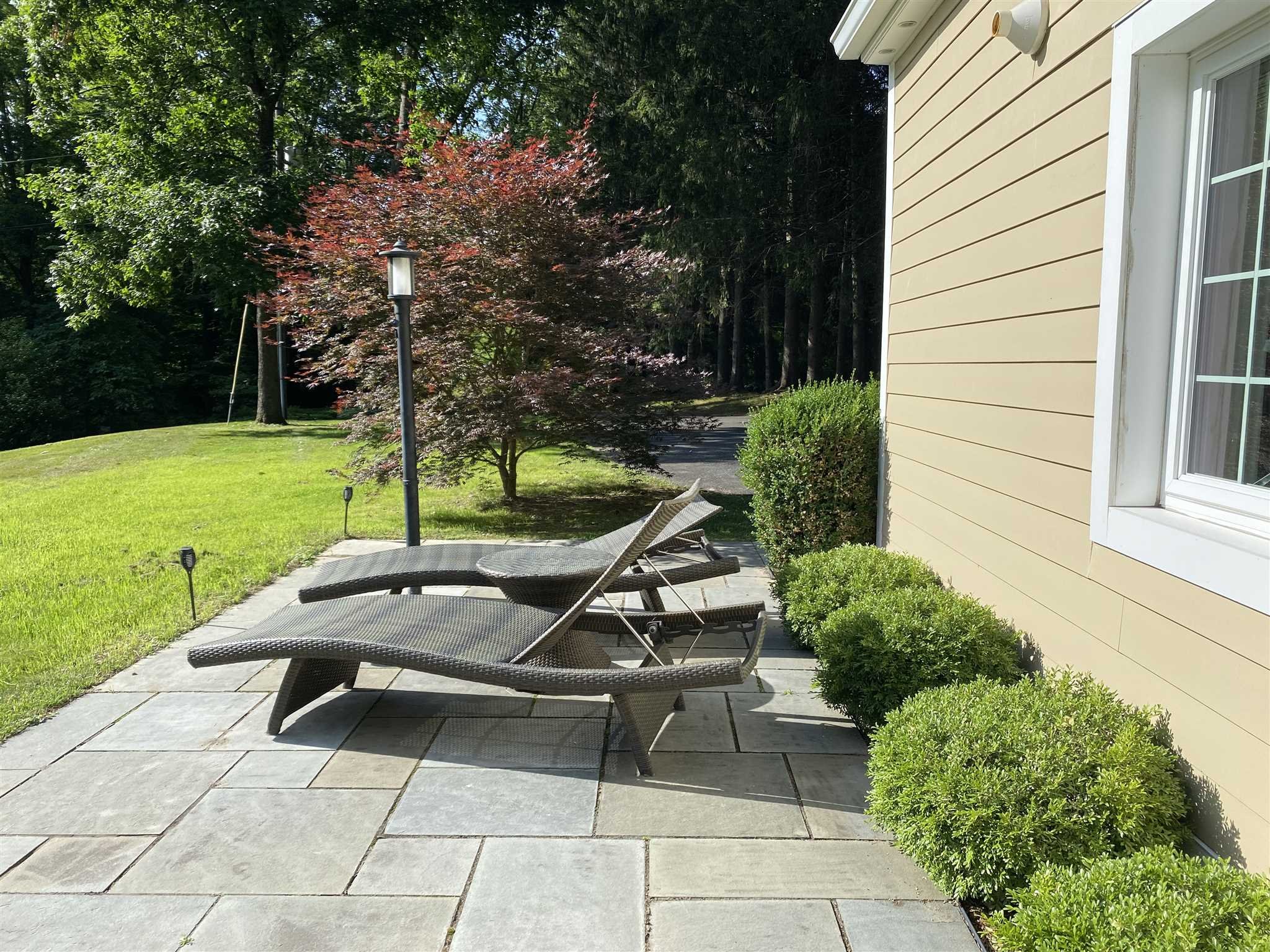 31 Robinson Road Salt Point, NY 12578 - Photo 5 of 27 a view of a patio with a table and chairs