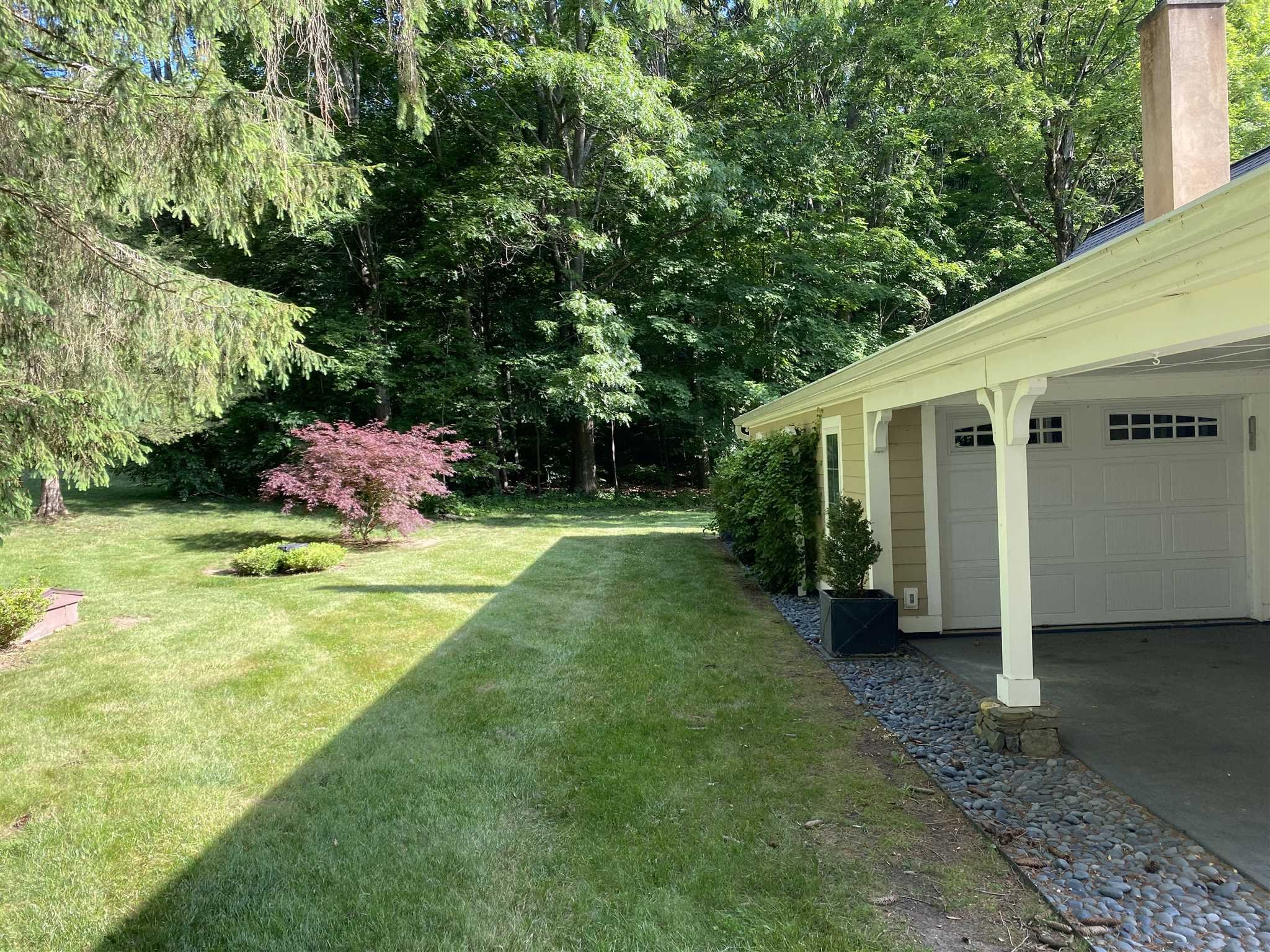 31 Robinson Road Salt Point, NY 12578 - Photo 9 of 27 a view of a white house with a big yard and large trees