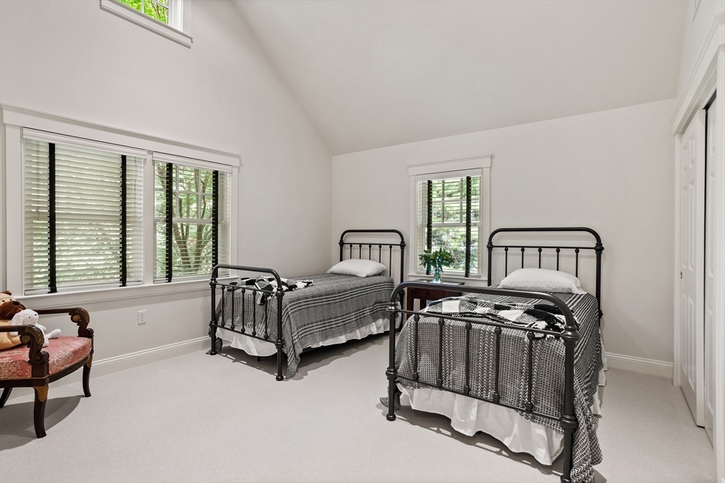 244 Musterfield Road Concord, MA 01742 - Photo 30 of 41 a bedroom with furniture and a window
