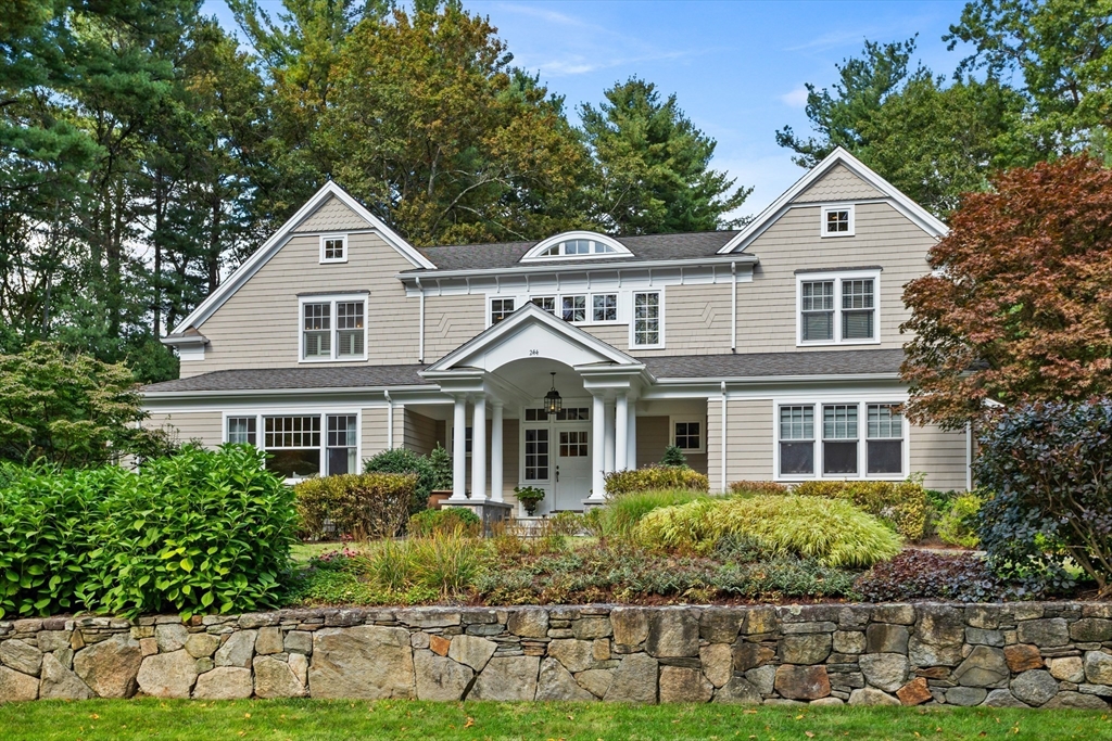 244 Musterfield Road Concord, MA 01742 - Photo 40 of 41 a front view of a house with a yard
