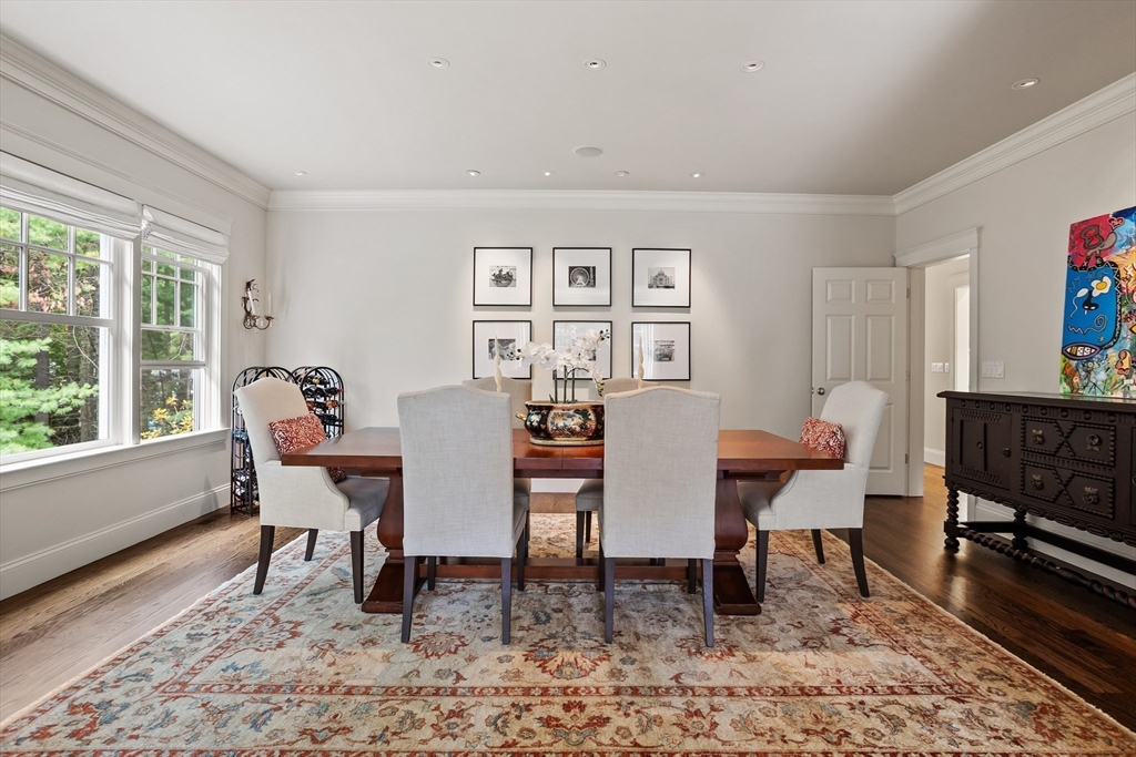 244 Musterfield Road Concord, MA 01742 - Photo 8 of 41 a view of a dining room with furniture window and wooden floor
