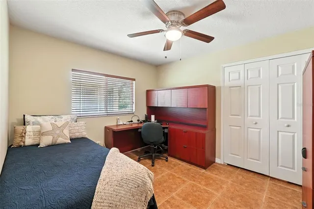 a bed room with furniture and a window