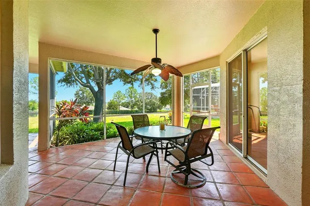 a dining room with furniture and outdoor view