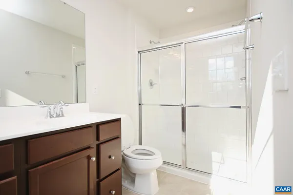 a bathroom with a sink a vanity and a mirror