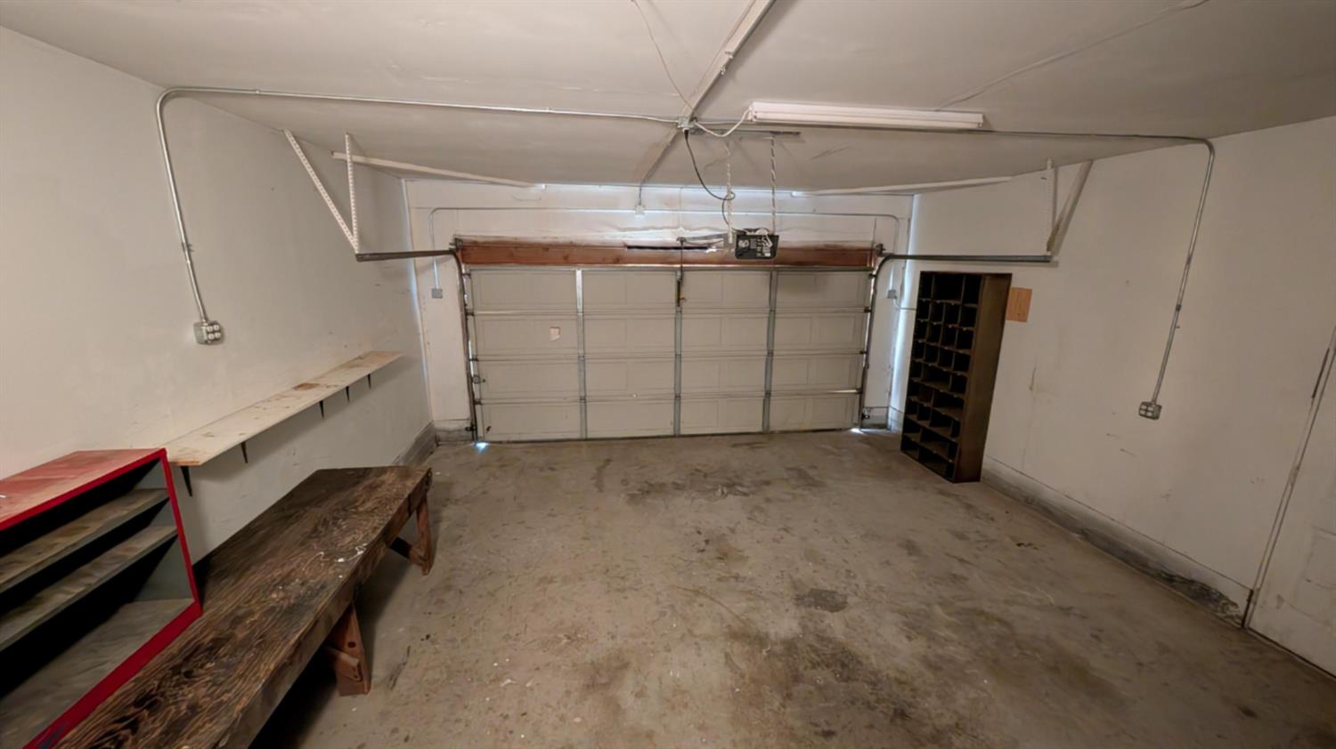 343 Deer Field Circle Copperopolis, CA 95228 - Photo 19 of 30 Garage has work bench and storage.