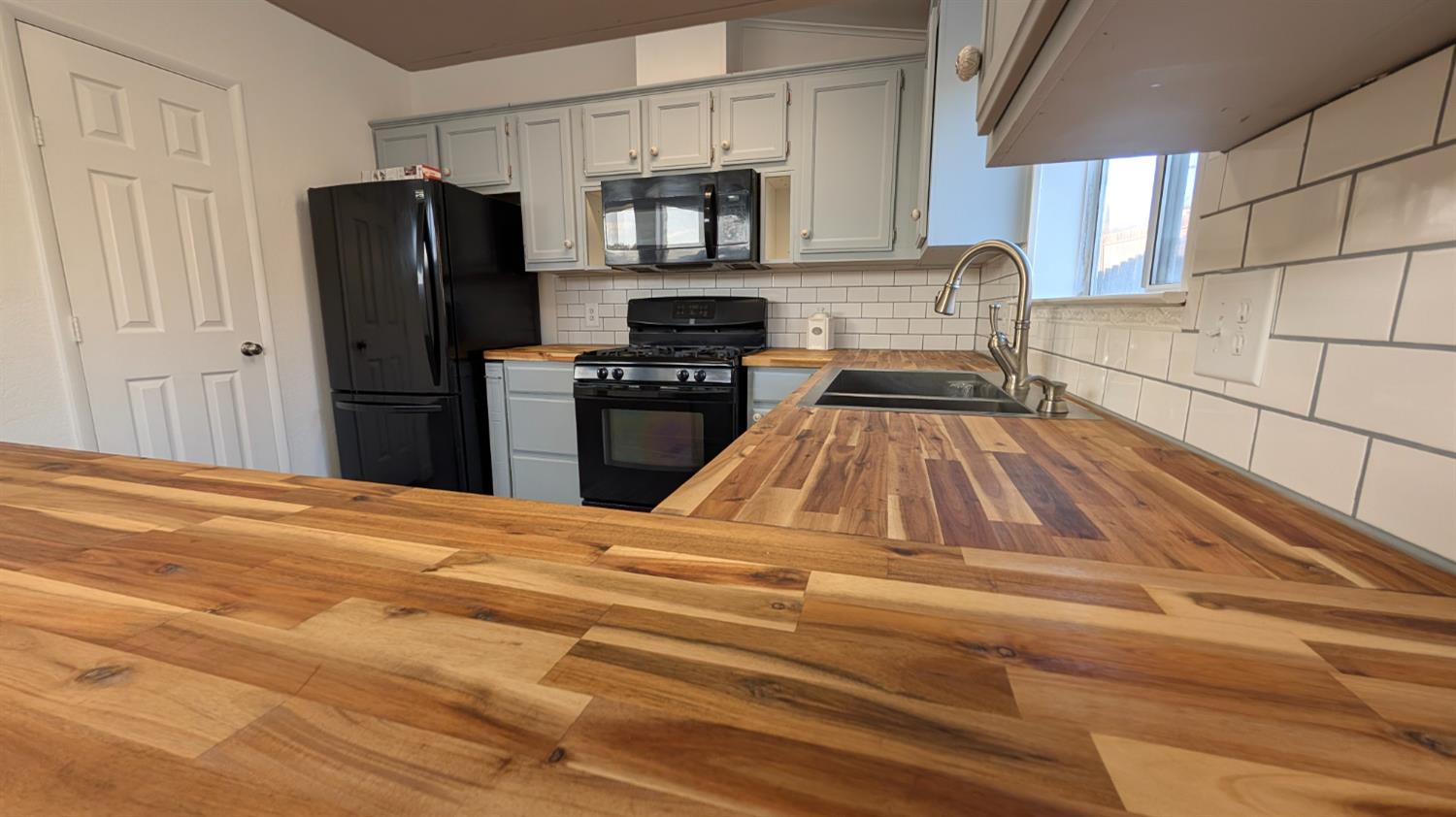 343 Deer Field Circle Copperopolis, CA 95228 - Photo 7 of 30 Beautiful Butcher Block Type countertops. Pantry Closet and ample cabinetry.