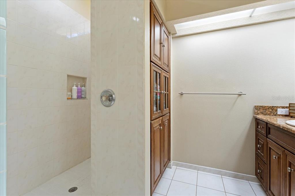 13624 Cooper Road Spring Hill, FL 34609 - Photo 11 of 75 a bathroom with a shower