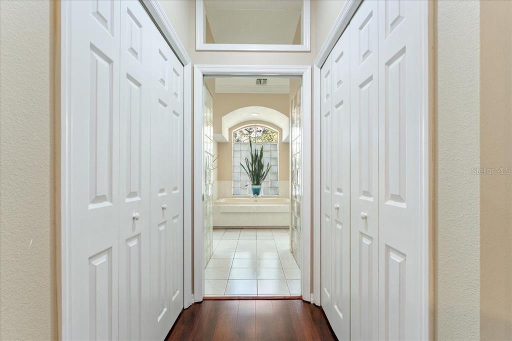 13624 Cooper Road Spring Hill, FL 34609 - Photo 34 of 75 a view of a hallway view with wooden floor