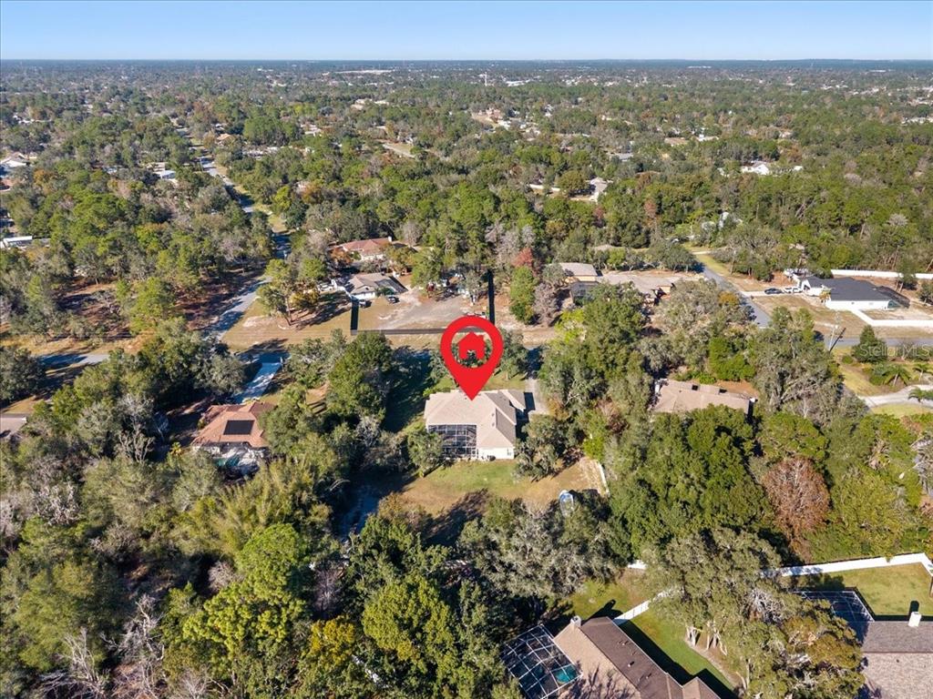 13624 Cooper Road Spring Hill, FL 34609 - Photo 73 of 75 an aerial view of multiple house