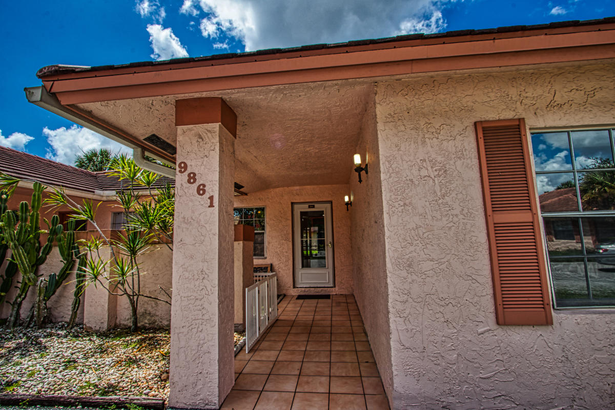 9861 Three Lakes Circle Boca Raton, FL 33428 - Photo 3 of 30 Front