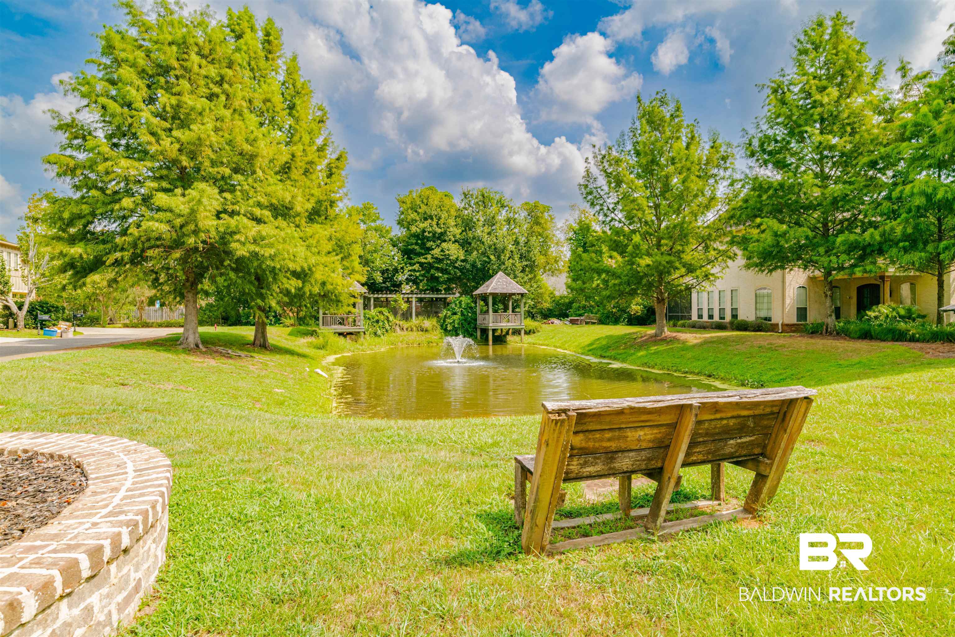 655 H Norman Lane Fairhope, AL 36532 - Photo 29 of 30 View of park area featuring a water view