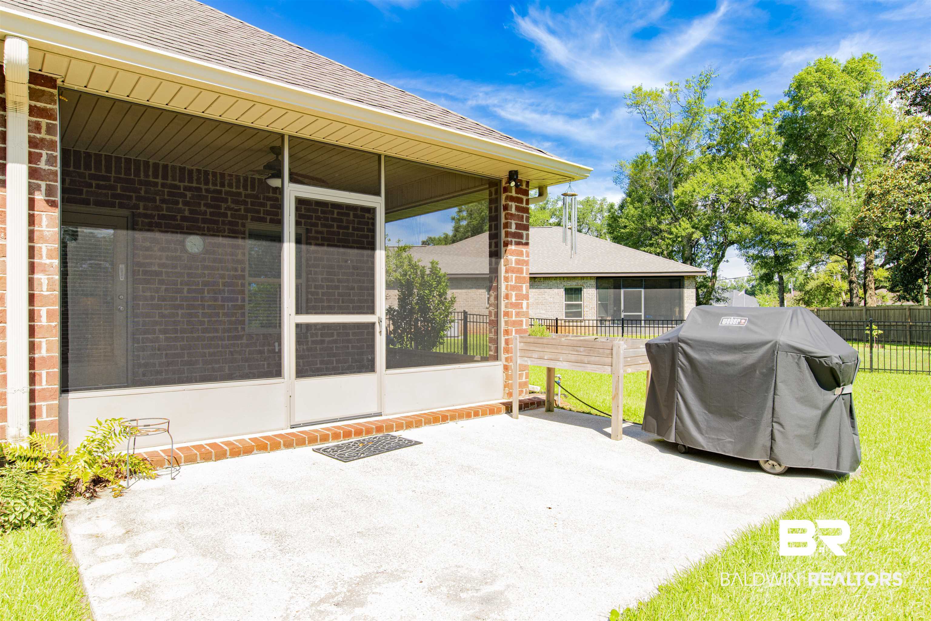 1476 Surrey Loop Foley, AL 36535 - Photo 29 of 31 View of patio with a sunroom and grilling area