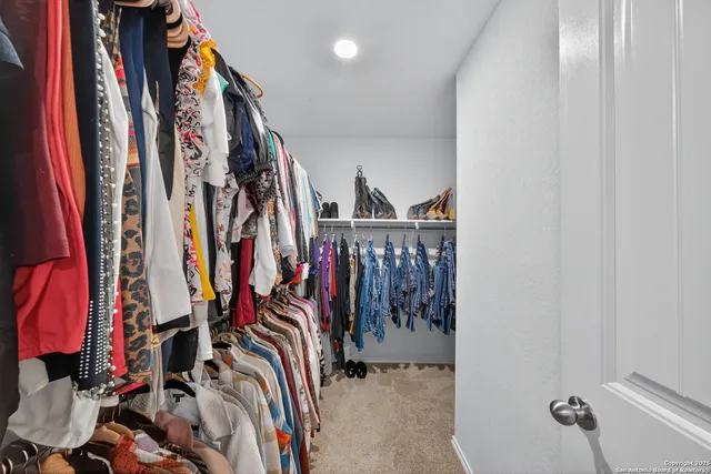 a view of livingroom with furniture and windows