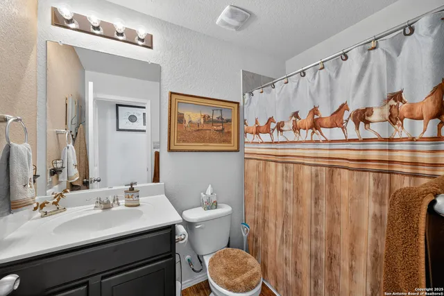 a view of a room with furniture and a fire pit