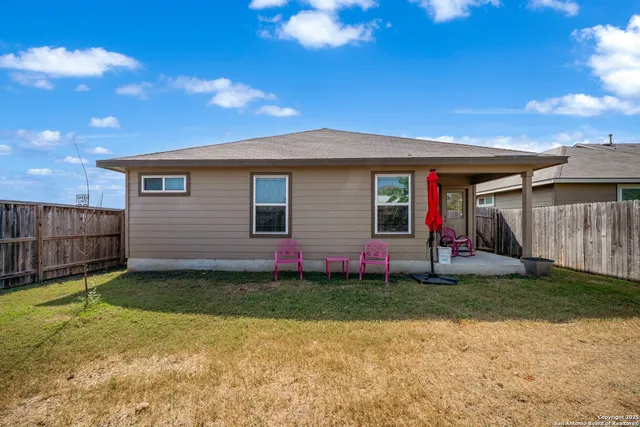 a view of a backyard with a garden