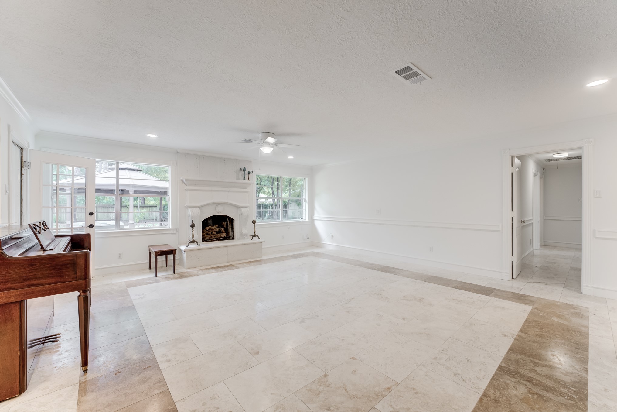 323 Spring Woods Drive Spring, TX 77386 - Photo 11 of 50 a living room with furniture and a fireplace
