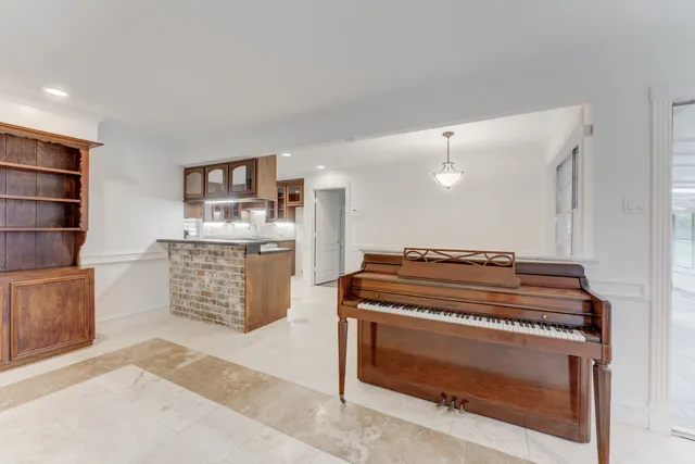 a kitchen with a stove and cabinets