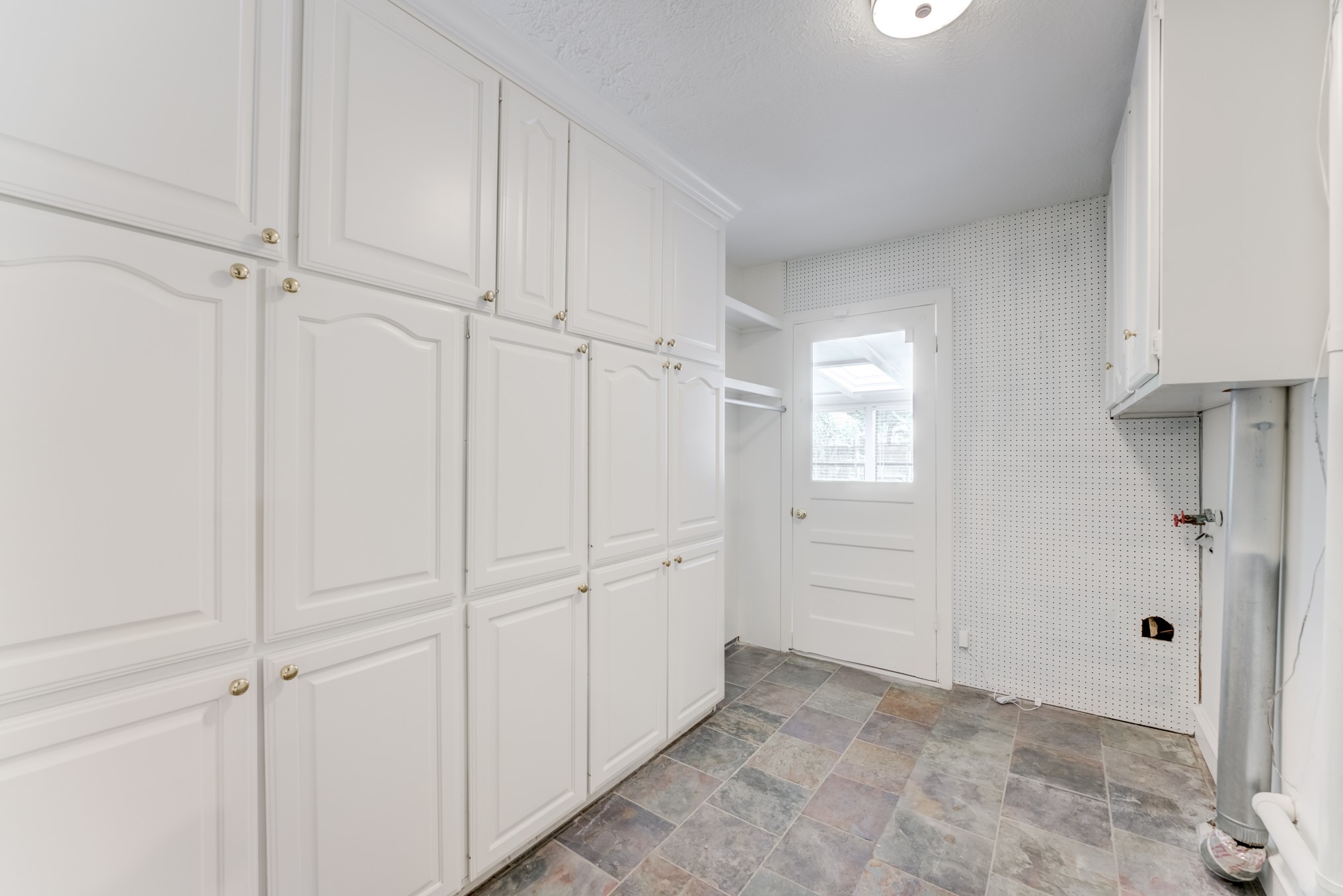 323 Spring Woods Drive Spring, TX 77386 - Photo 22 of 50 a view of a closet area with hallway