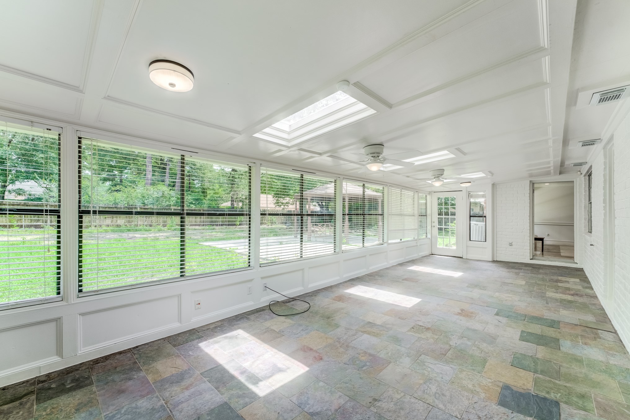 323 Spring Woods Drive Spring, TX 77386 - Photo 24 of 50 a view of an empty room with a large window