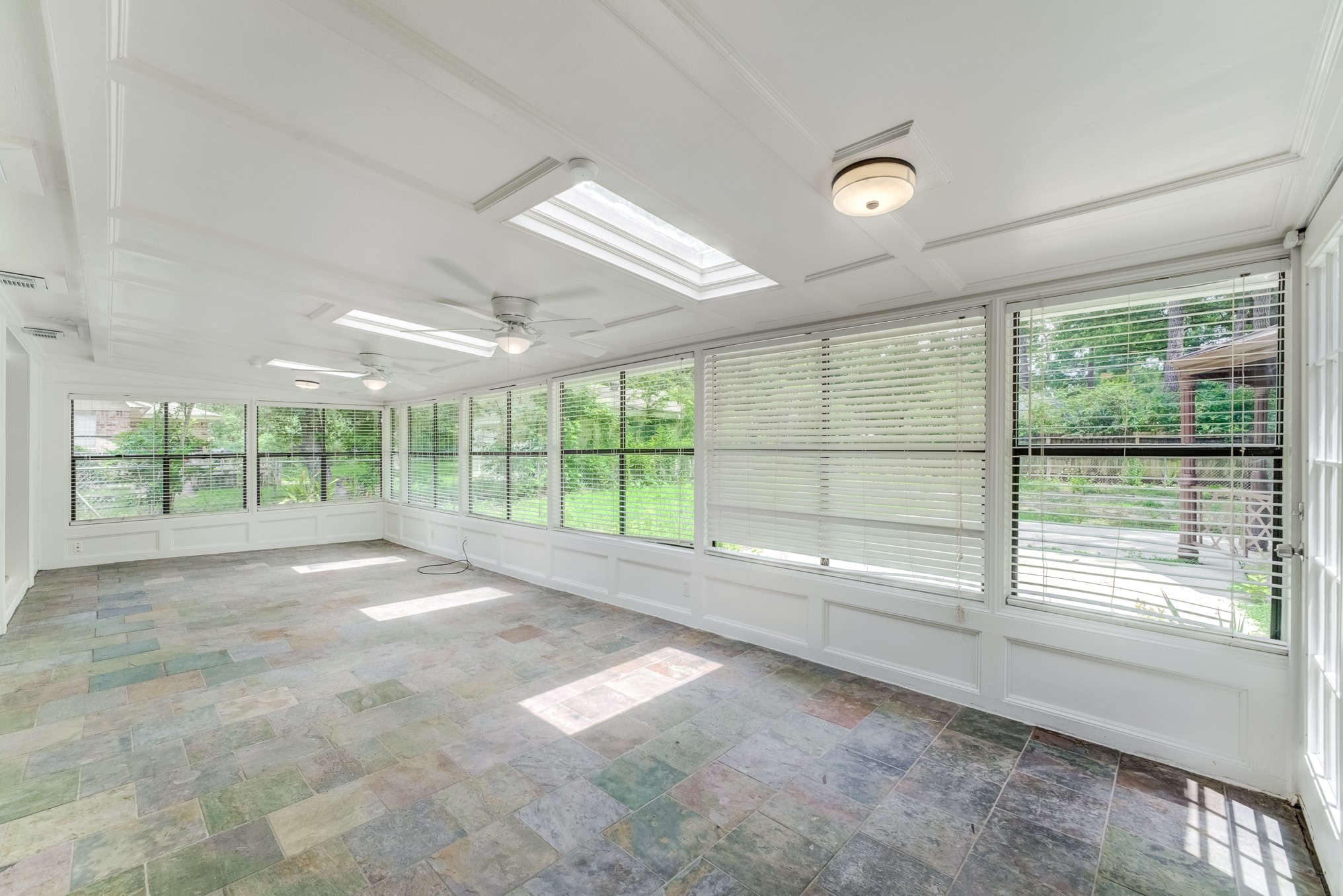 323 Spring Woods Drive Spring, TX 77386 - Photo 25 of 50 a view of an empty room with a large window