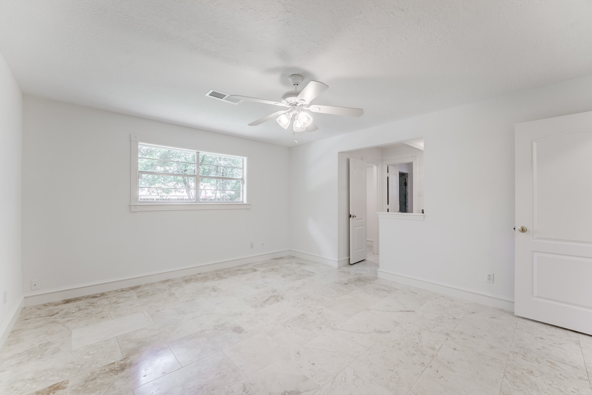 323 Spring Woods Drive Spring, TX 77386 - Photo 27 of 50 a view of an empty room with a window