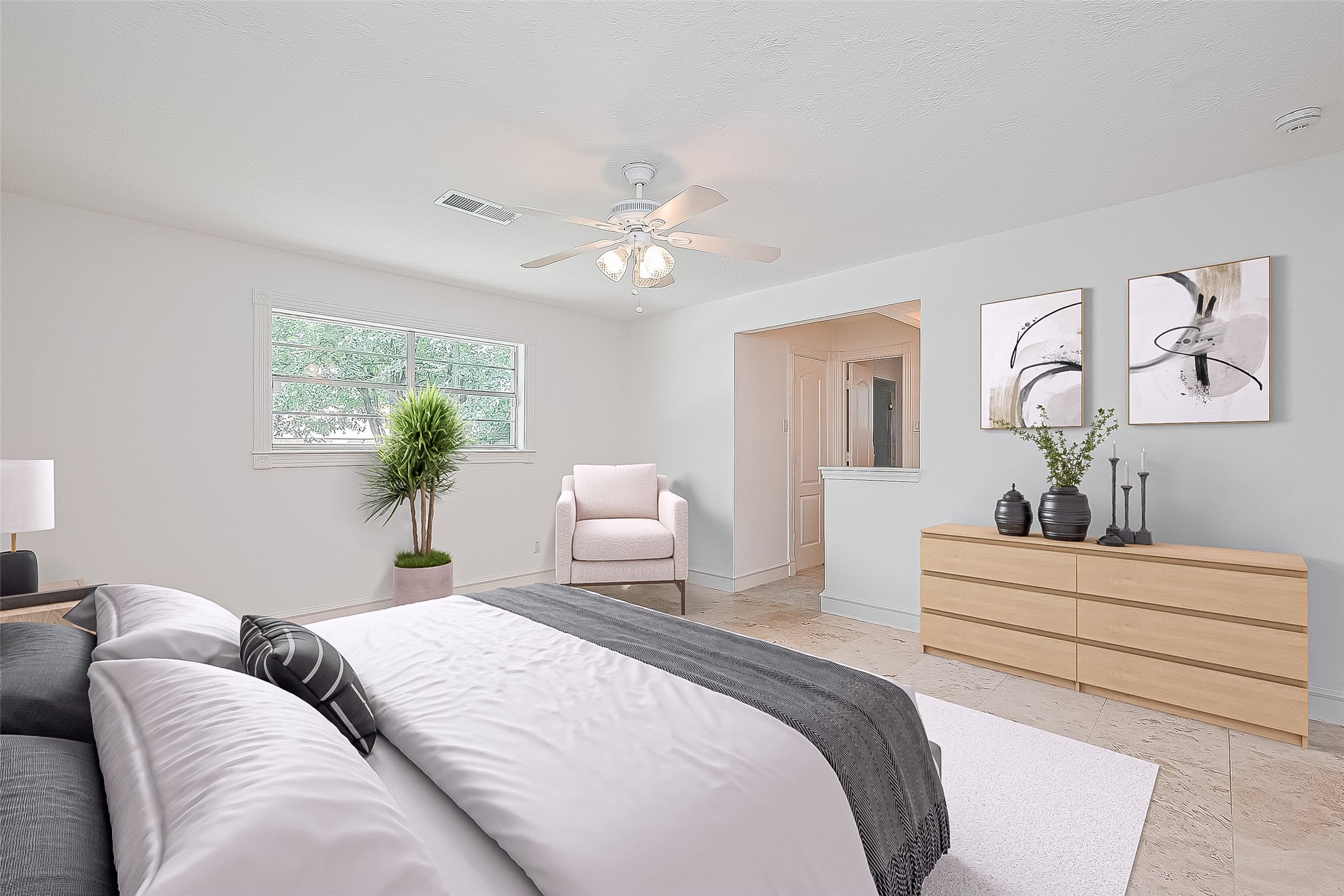 323 Spring Woods Drive Spring, TX 77386 - Photo 39 of 50 a bedroom with a bed and a chandelier