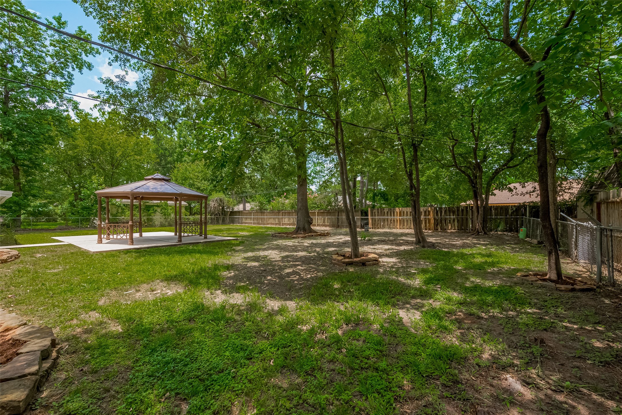 323 Spring Woods Drive Spring, TX 77386 - Photo 48 of 50 a view of a park with large trees