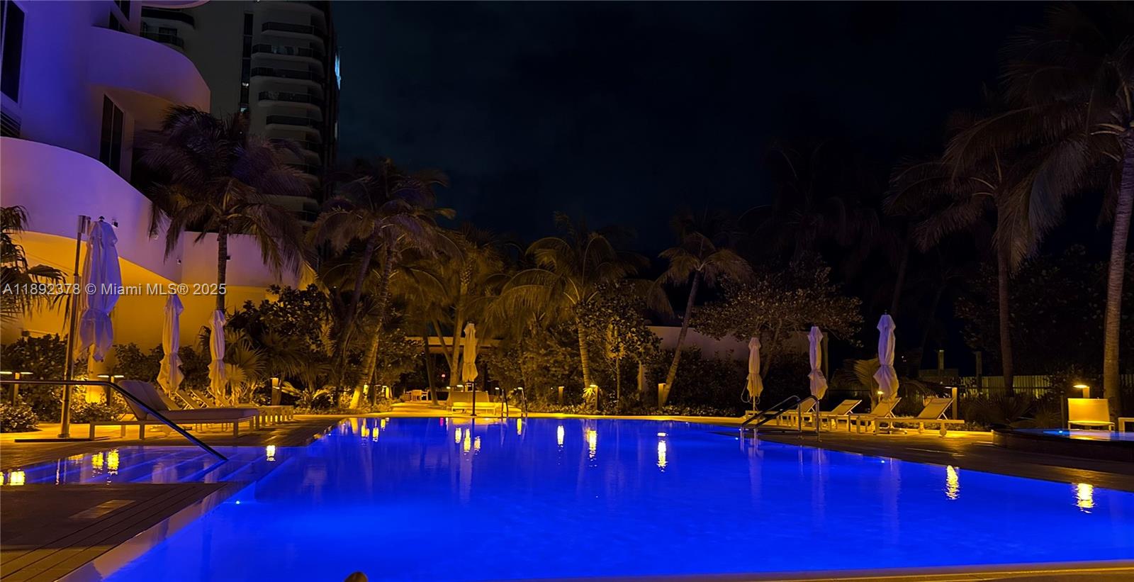 6365 Collins Avenue, Unit 3611 Miami Beach, FL 33141 - Photo 18 of 20 a view of swimming pool with outdoor seating