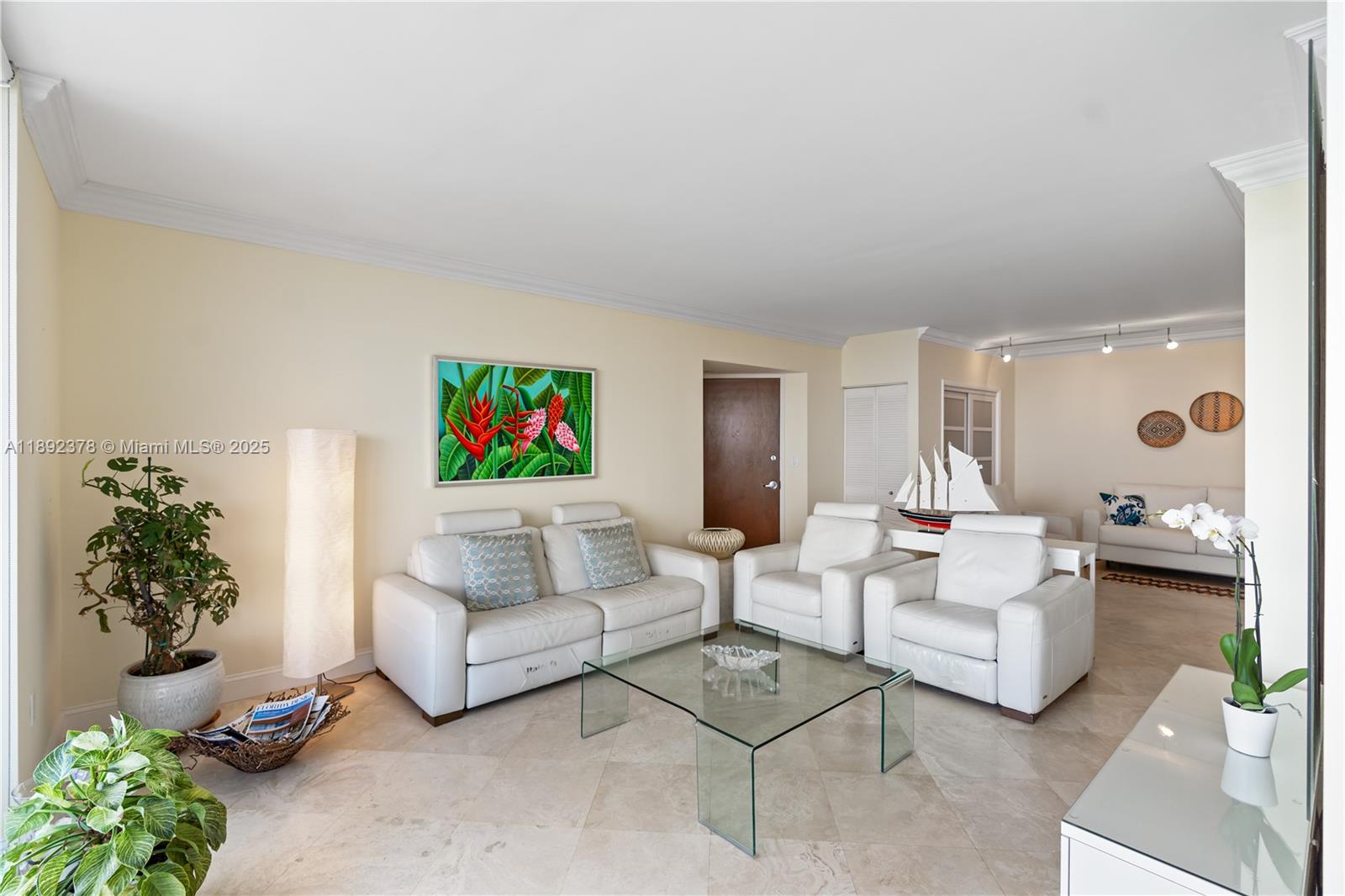 6365 Collins Avenue, Unit 3611 Miami Beach, FL 33141 - Photo 7 of 20 a living room with furniture and a couch