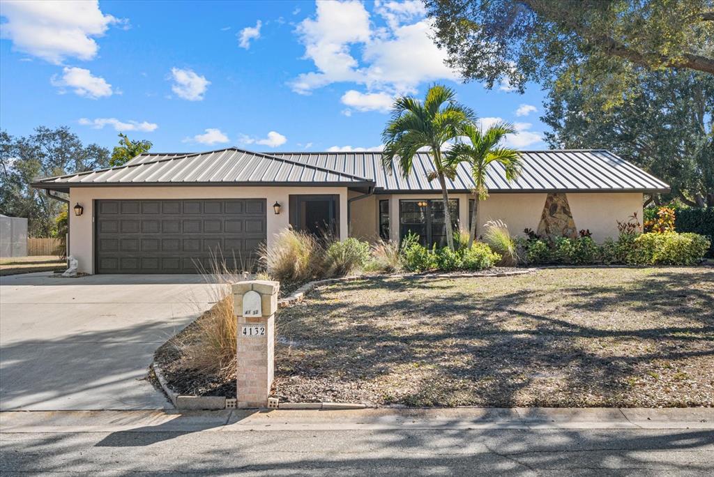 4132 Prairie View Drive Sarasota, FL 34232 - Photo 2 of 24 a front view of a house