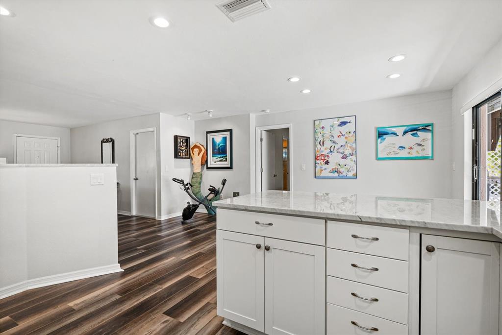 4132 Prairie View Drive Sarasota, FL 34232 - Photo 7 of 24 a spacious bathroom with a sink and a mirror