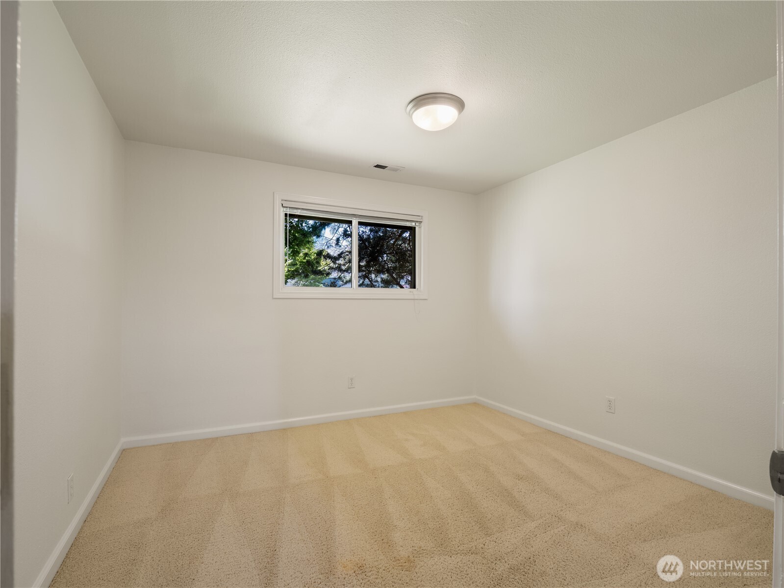 247 South D Street Buckley, WA 98321 - Photo 11 of 28 an empty room with windows