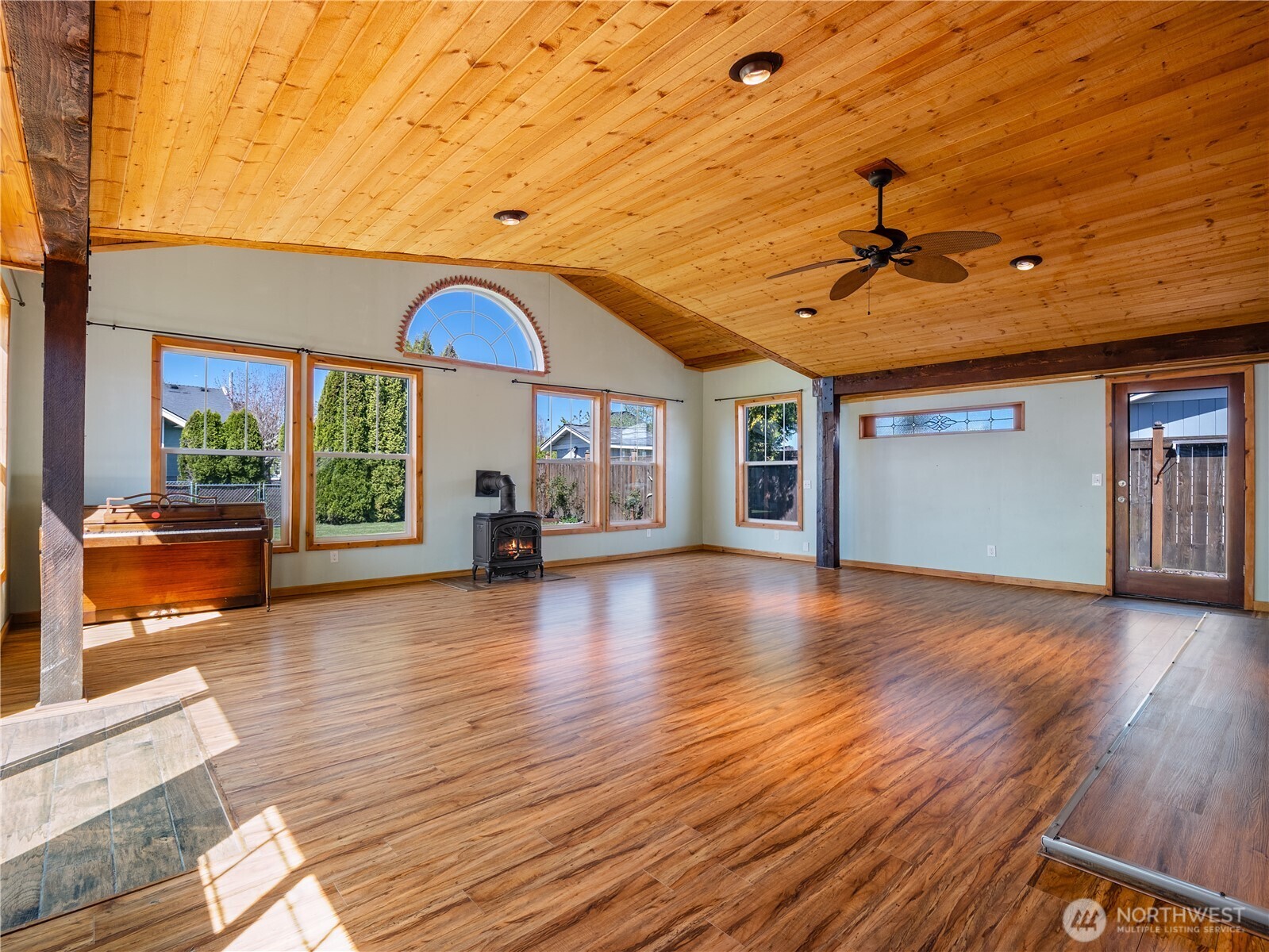 247 South D Street Buckley, WA 98321 - Photo 17 of 28 a view of empty room with wooden floor and fan