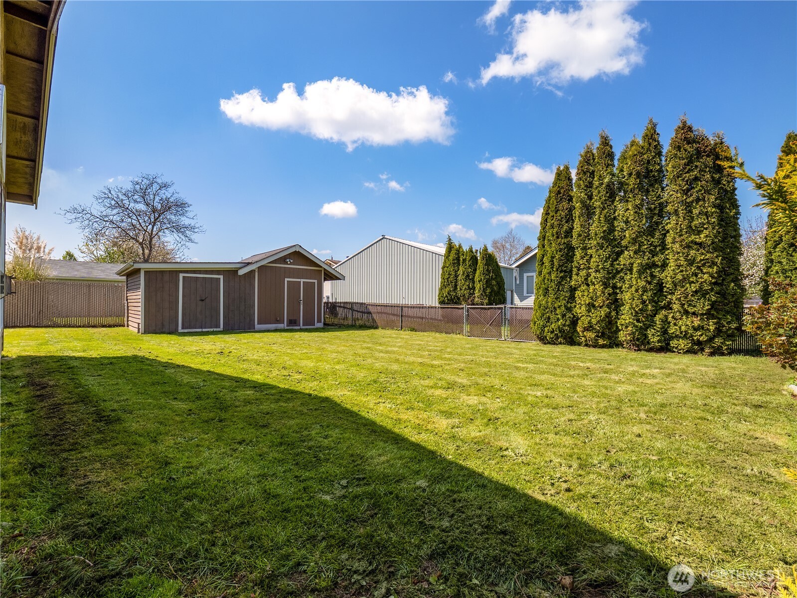 247 South D Street Buckley, WA 98321 - Photo 19 of 28 a swimming pool with an outdoor space