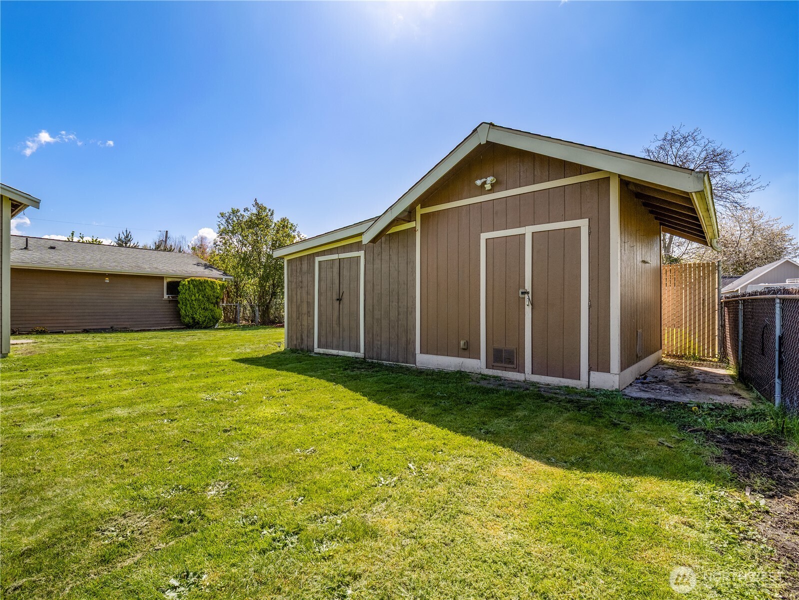 247 South D Street Buckley, WA 98321 - Photo 22 of 28 a view of a house with backyard