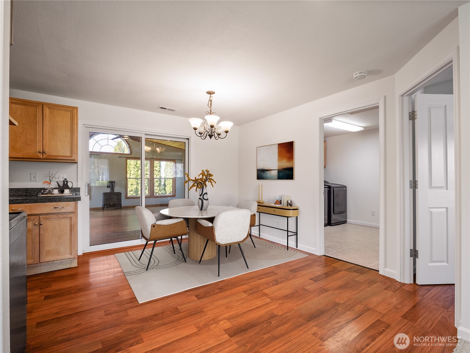 247 South D Street Buckley, WA 98321 - Photo 5 of 28 a living room with furniture a dining table and kitchen view