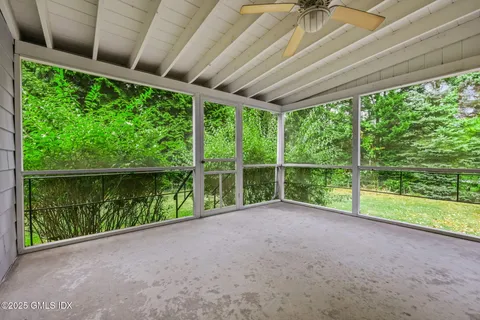 a view of a room with a large window