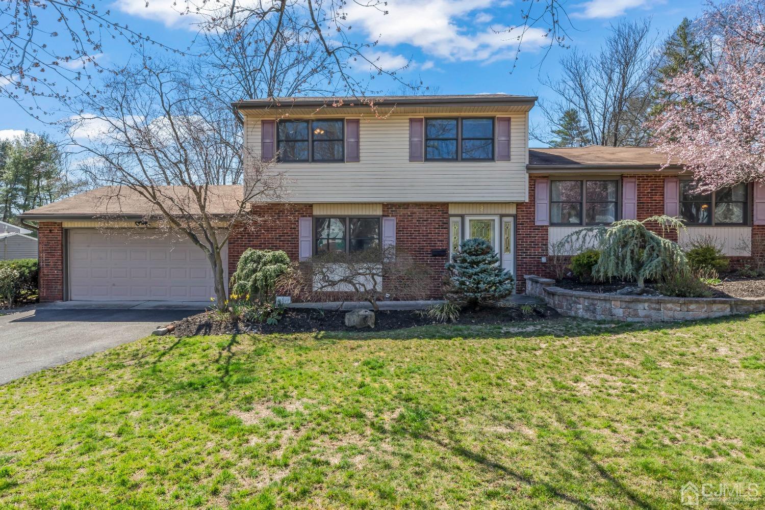 2 Perry Road East Brunswick, NJ 08816 - Photo 1 of 32 a front view of a house with garden
