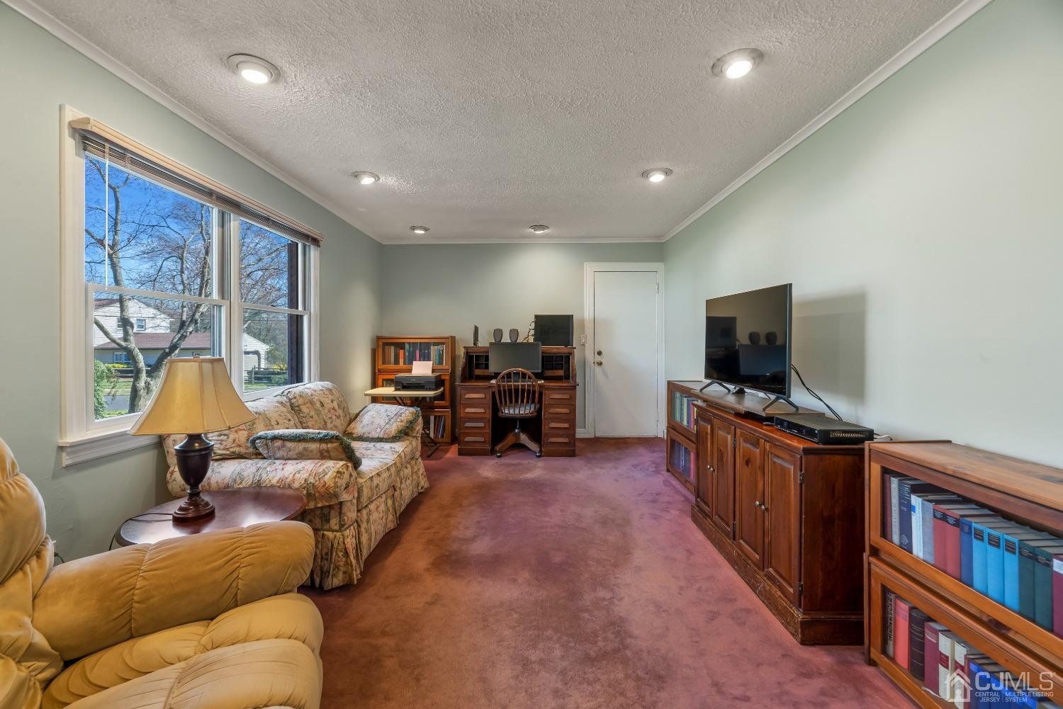 2 Perry Road East Brunswick, NJ 08816 - Photo 14 of 32 a living room with furniture and a flat screen tv