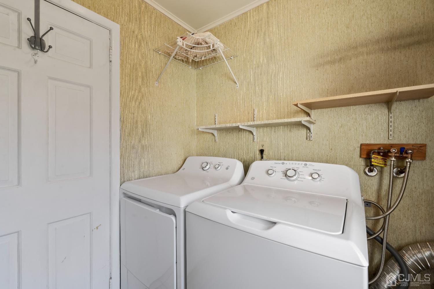 2 Perry Road East Brunswick, NJ 08816 - Photo 17 of 32 a utility room with dryer and washer