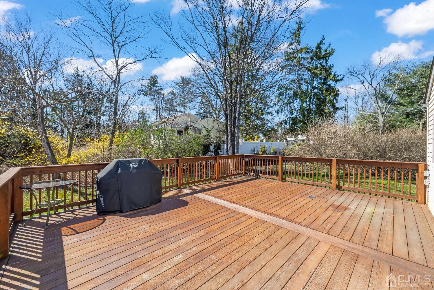 2 Perry Road East Brunswick, NJ 08816 - Photo 25 of 32 a view of balcony with wooden floor and outdoor seating