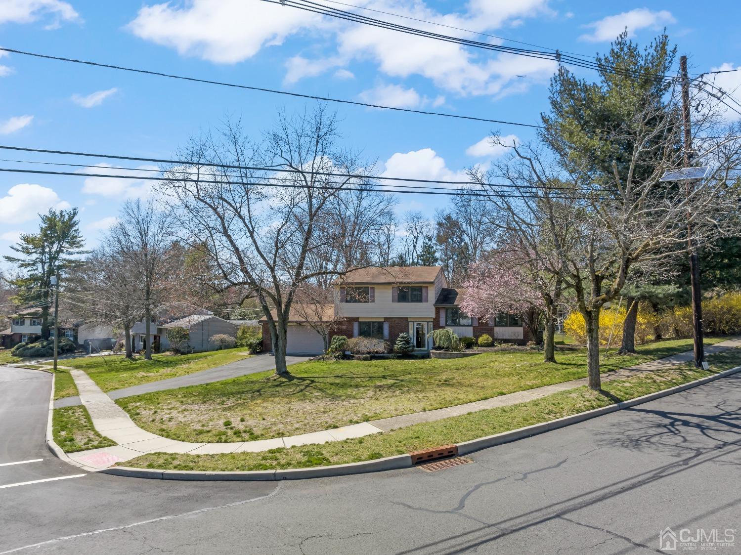 2 Perry Road East Brunswick, NJ 08816 - Photo 3 of 32 a view of a fountain with a big yard
