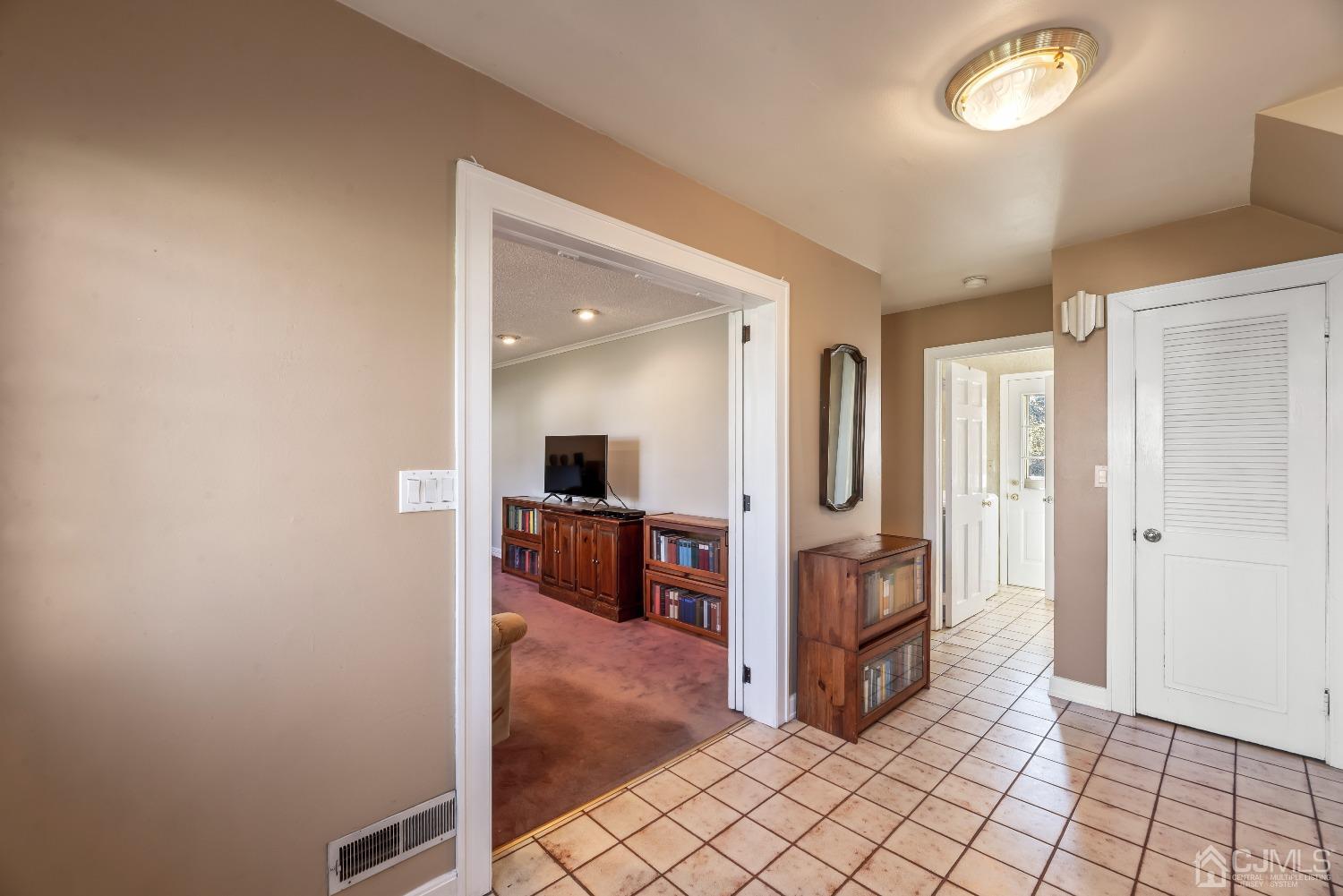 2 Perry Road East Brunswick, NJ 08816 - Photo 4 of 32 a view of a hallway with bathroom