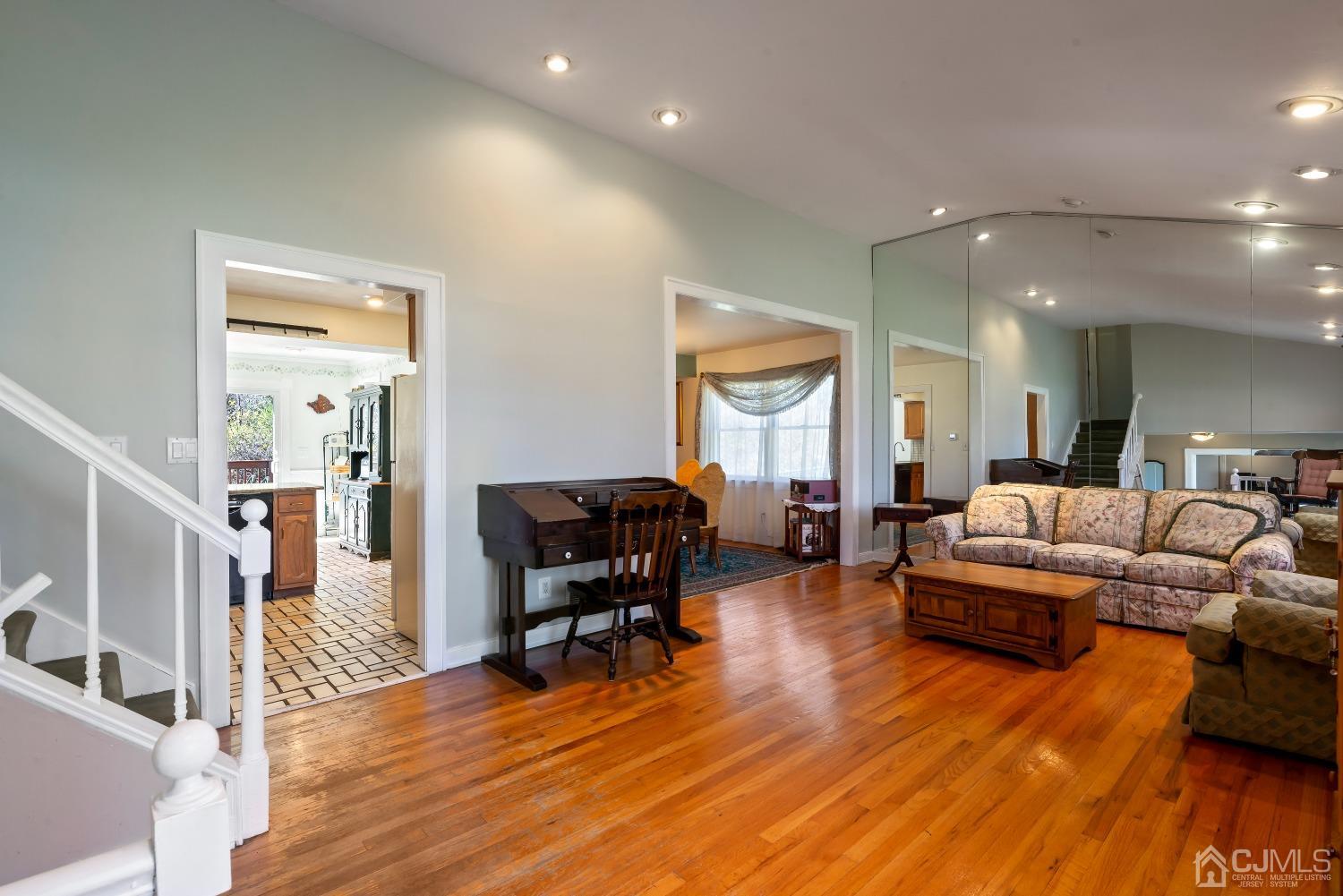 2 Perry Road East Brunswick, NJ 08816 - Photo 6 of 32 a living room with furniture and a wooden floor